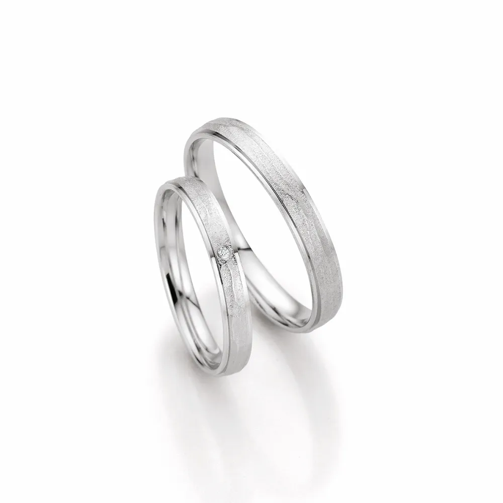 Alianzas de boda de platino con diamante