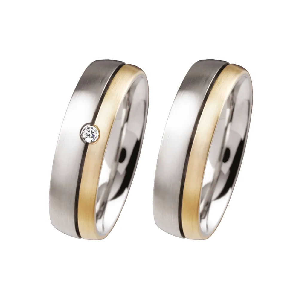 Alianzas de boda de acero y oro amarillo con diamante