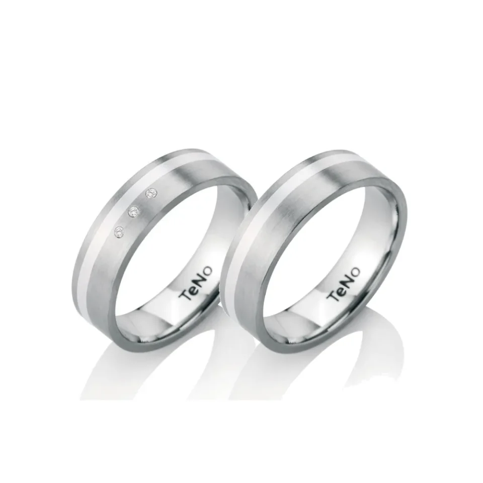 Alianzas de boda de acero y plata con diamantes
