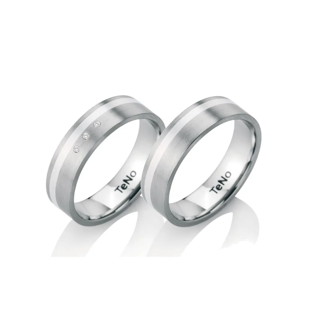 Alianzas de boda de acero y plata con diamantes