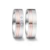 Alianzas de boda de acero y oro rosado con diamantes
