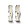 Alianzas de boda de acero y oro amarillo con diamante