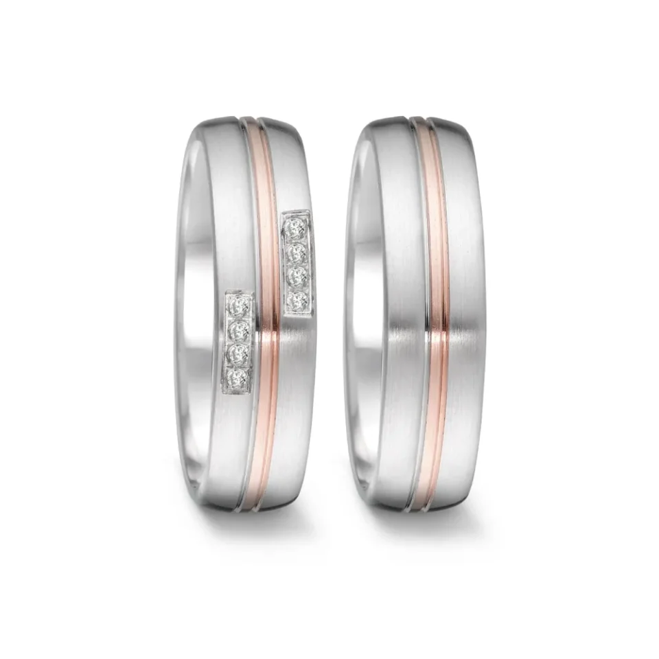 Alianzas de boda de acero y oro rosado con diamantes