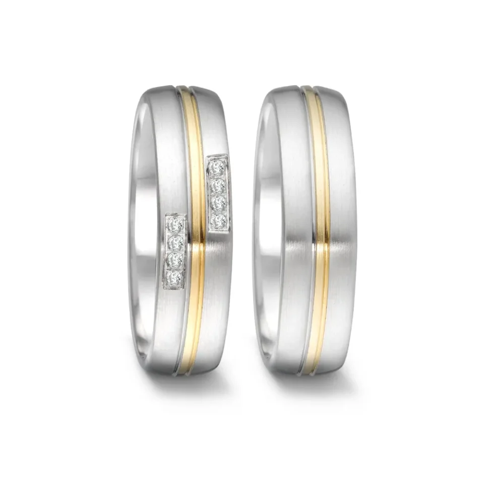 Alianzas de boda de acero y oro amarillo con diamantes