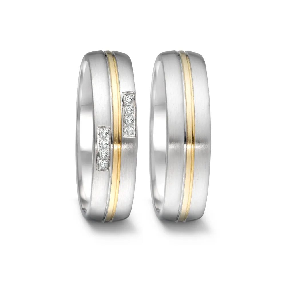 Alianzas de boda de acero y oro amarillo con diamantes