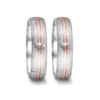 Alianzas de boda de acero y oro rosado con diamantes