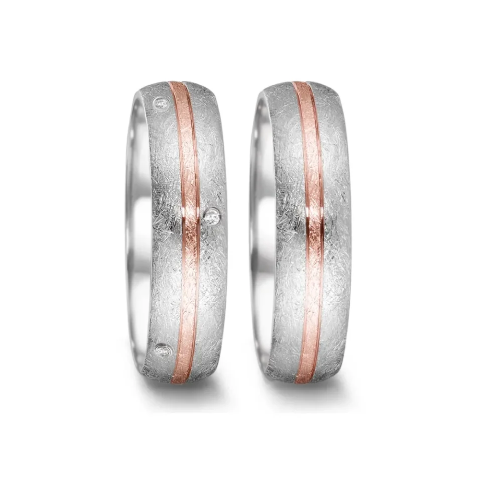 Alianzas de boda de acero y oro rosado con diamantes