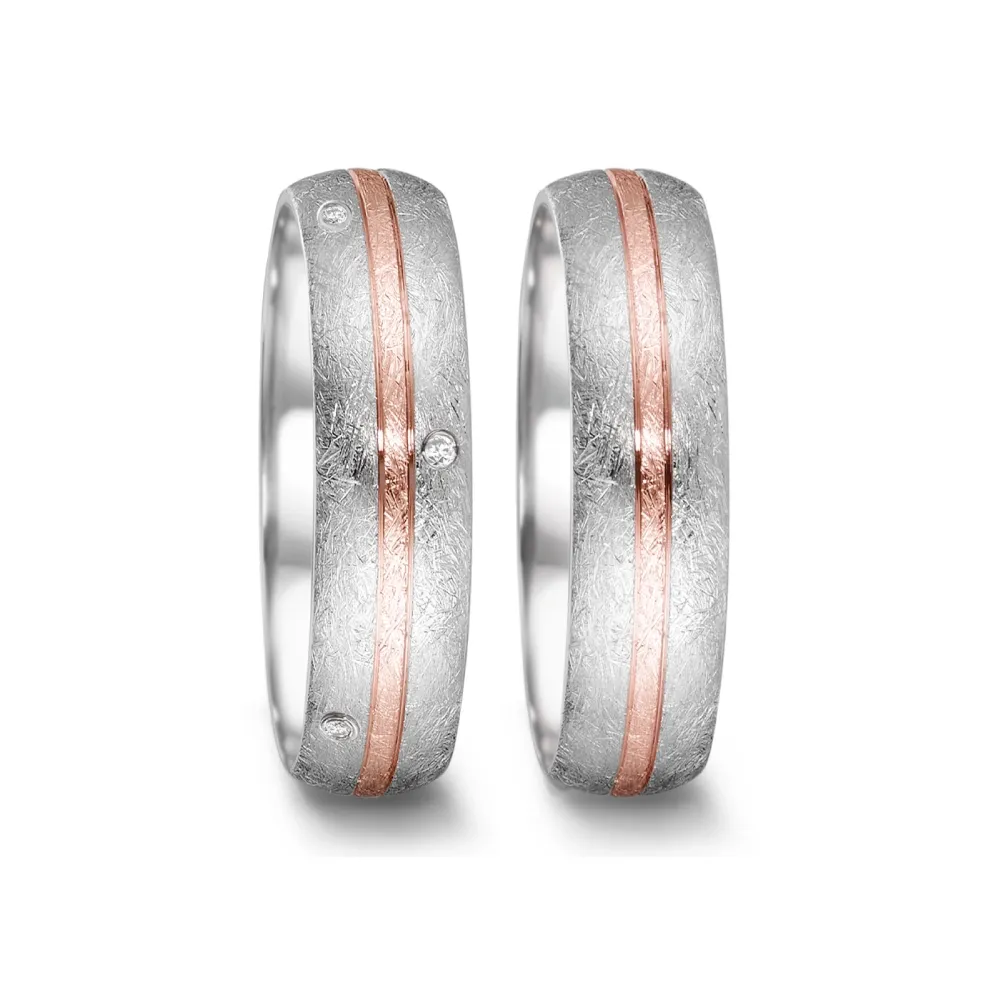 Alianzas de boda de acero y oro rosado con diamantes