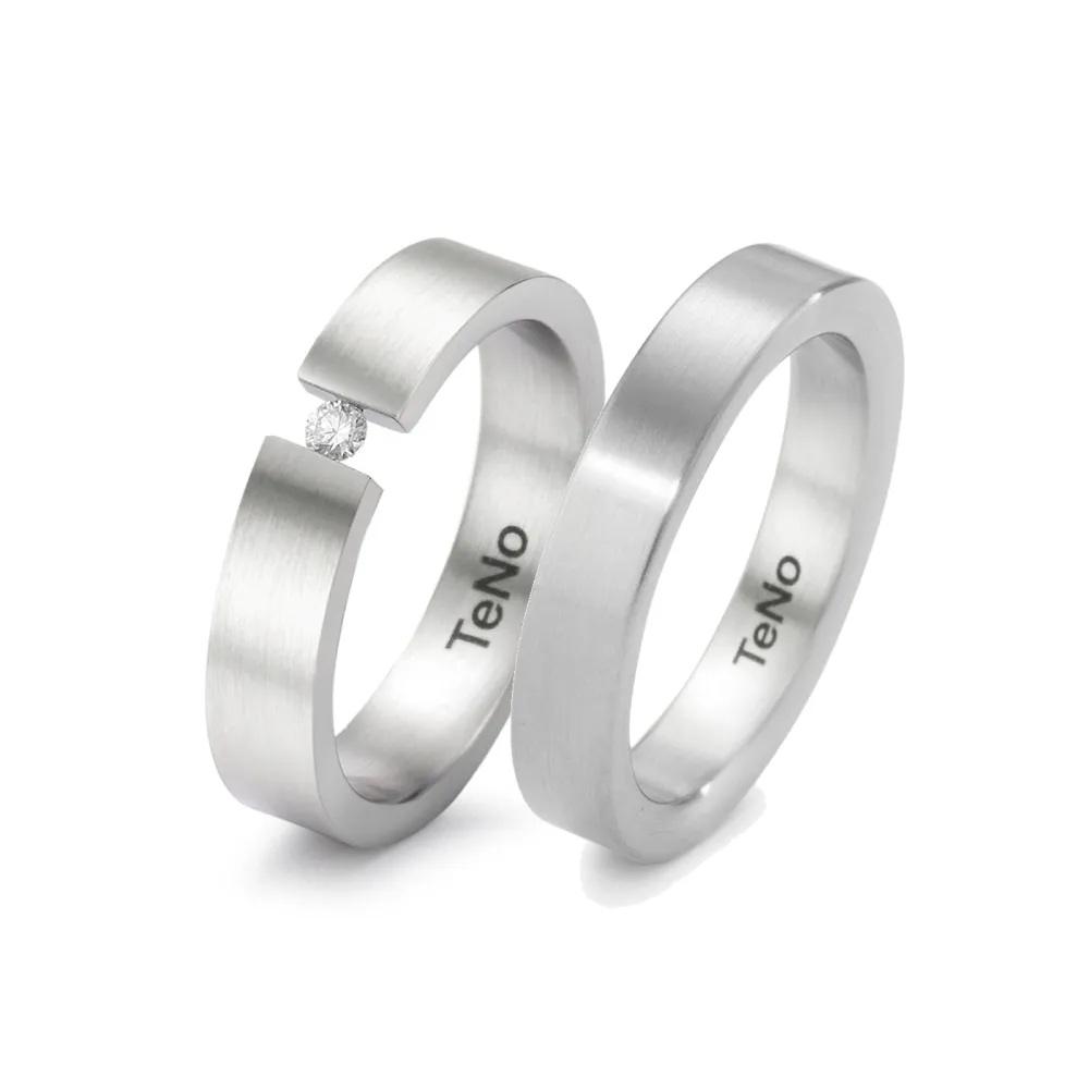 Alianzas de boda de acero con diamante