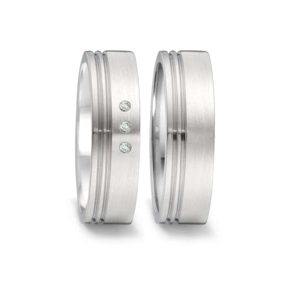 Alianzas de boda de acero con diamantes