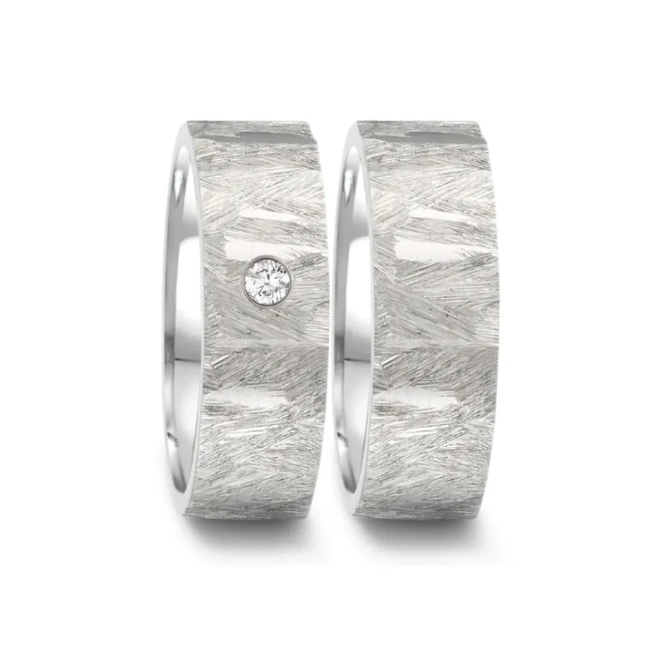 Alianzas de boda de acero con diamante