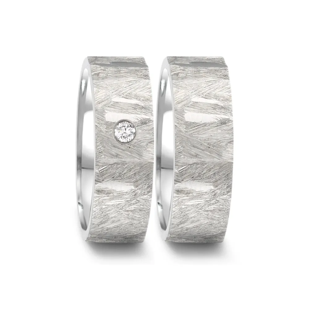 Alianzas de boda de acero con diamante