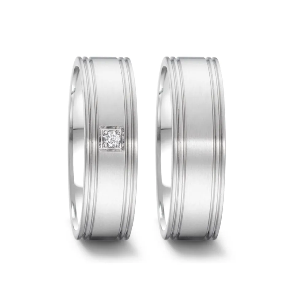 Alianzas de boda de acero con diamante