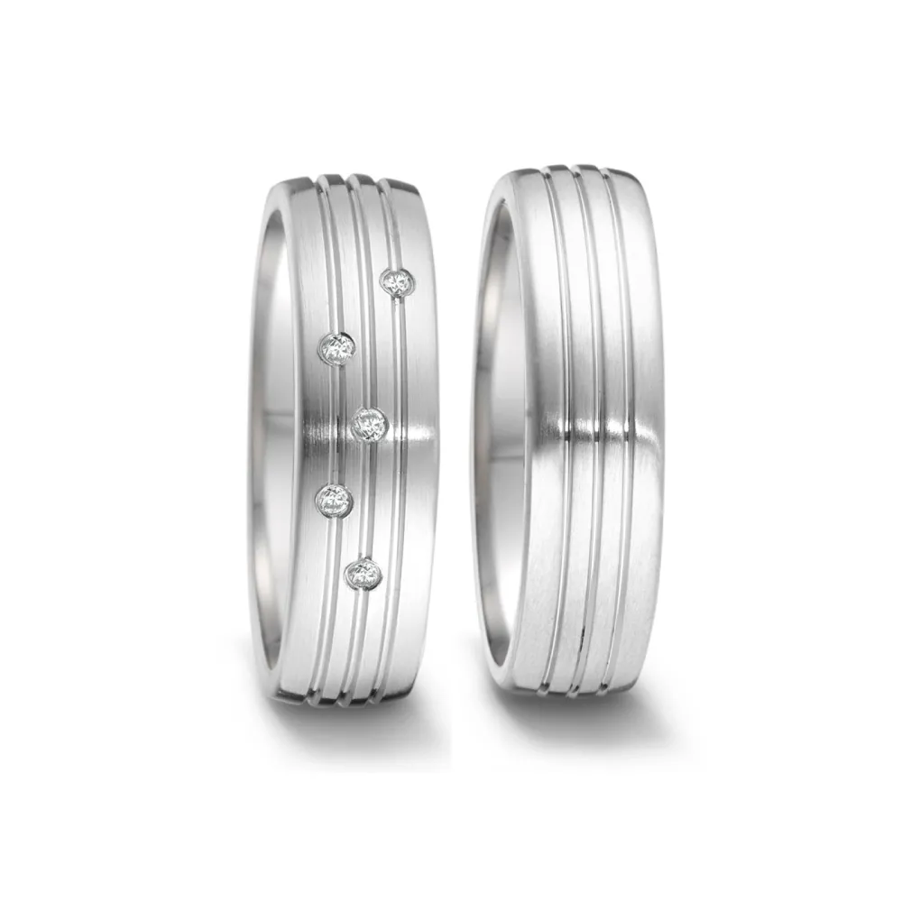 Alianzas de boda de acero con diamantes