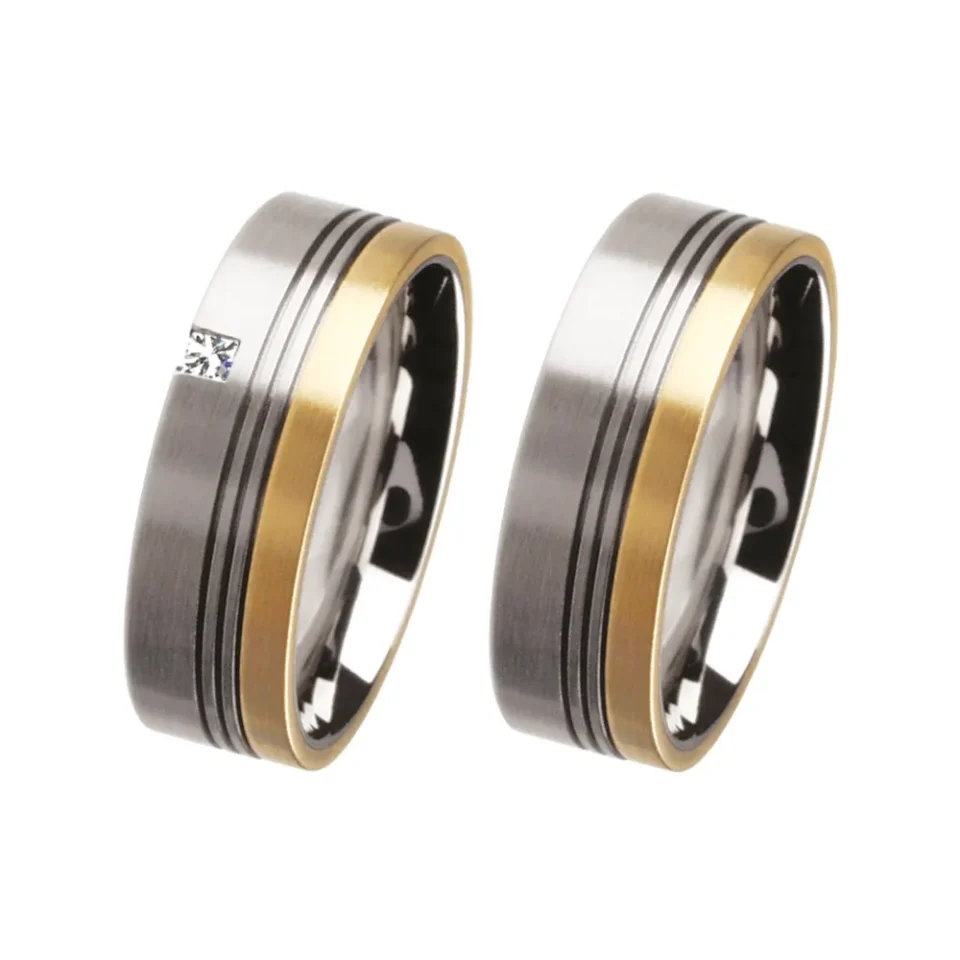 Alianzas de boda de acero y oro amarillo con diamante