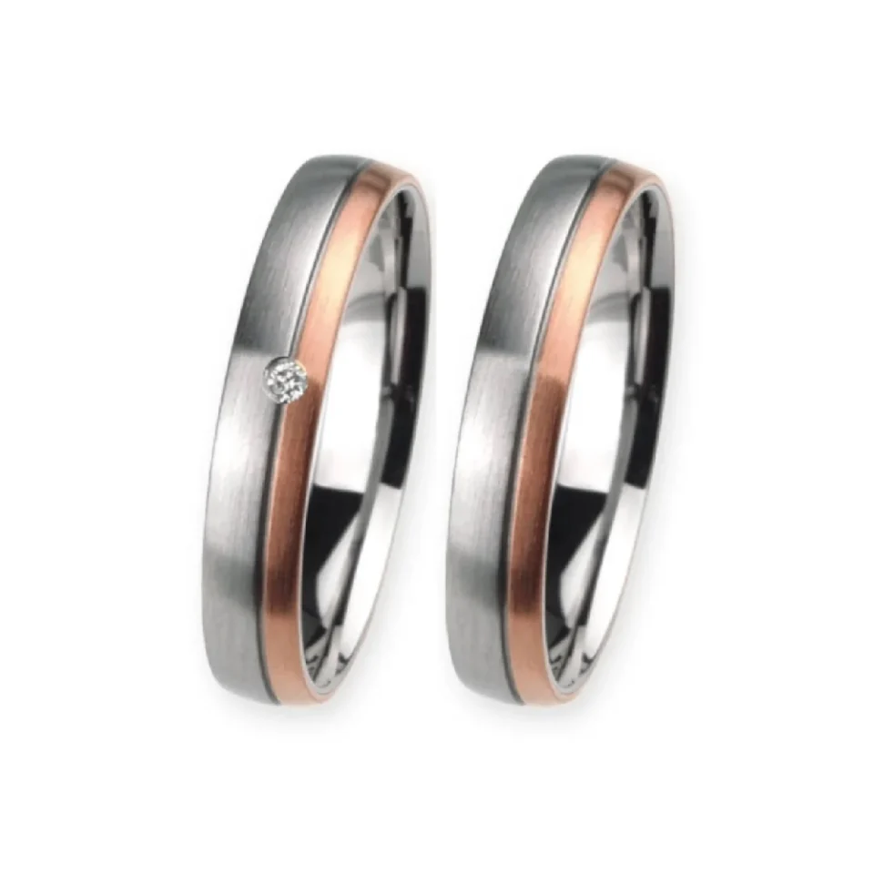 Alianzas de boda de acero y oro rosado con diamante
