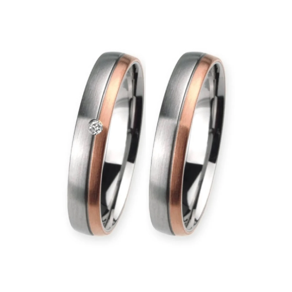 Alianzas de boda de acero y oro rosado con diamante