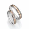 Alianzas de boda de titanio y oro rosado con diamantes
