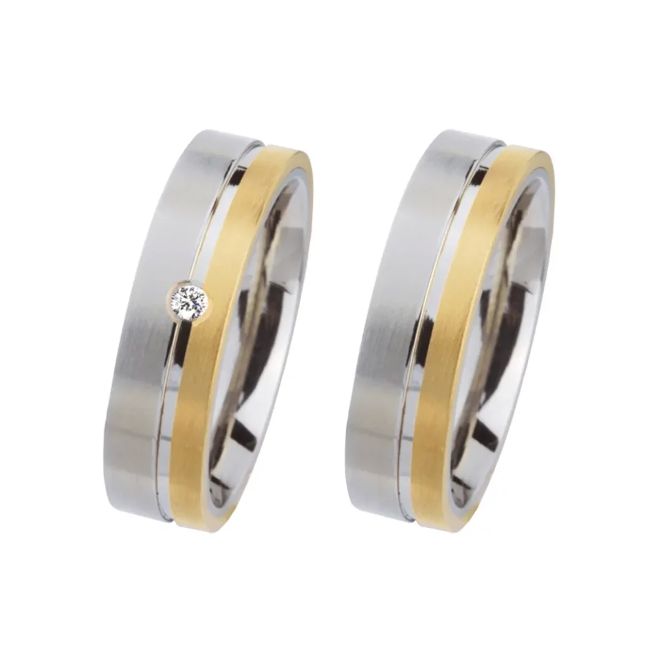 Alianzas de boda de acero y oro amarillo con diamante