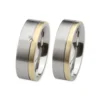 Alianzas de boda de acero y oro amarillo con diamante