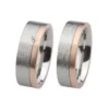 Alianzas de boda de acero y oro rosado con diamante
