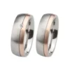 Alianzas de boda de acero y oro rosado con diamante