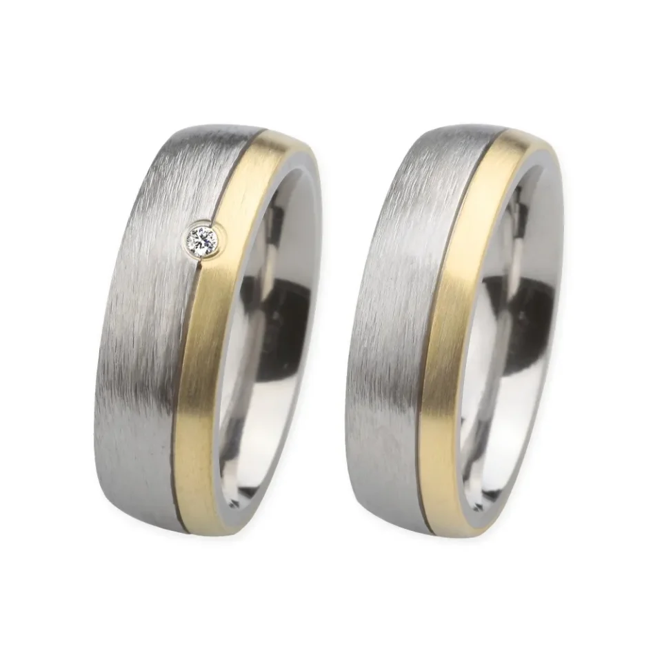 Alianzas de boda de acero y oro amarillo con diamante