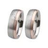 Alianzas de boda de acero y oro rosado con diamante