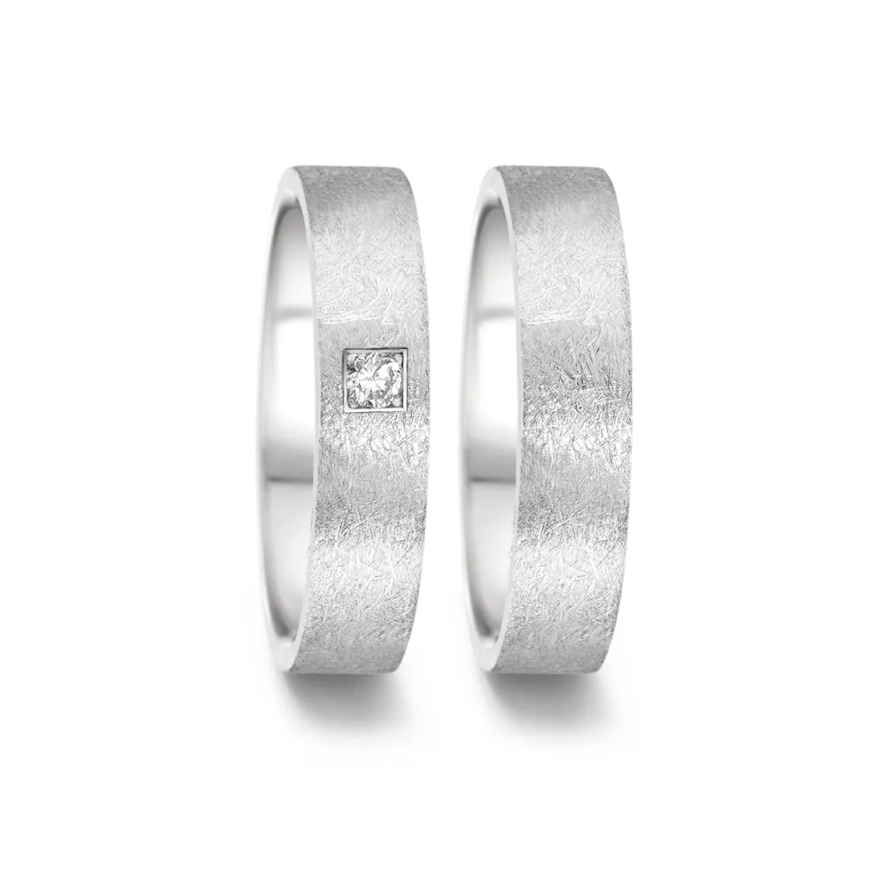Alianzas de boda de acero con diamante