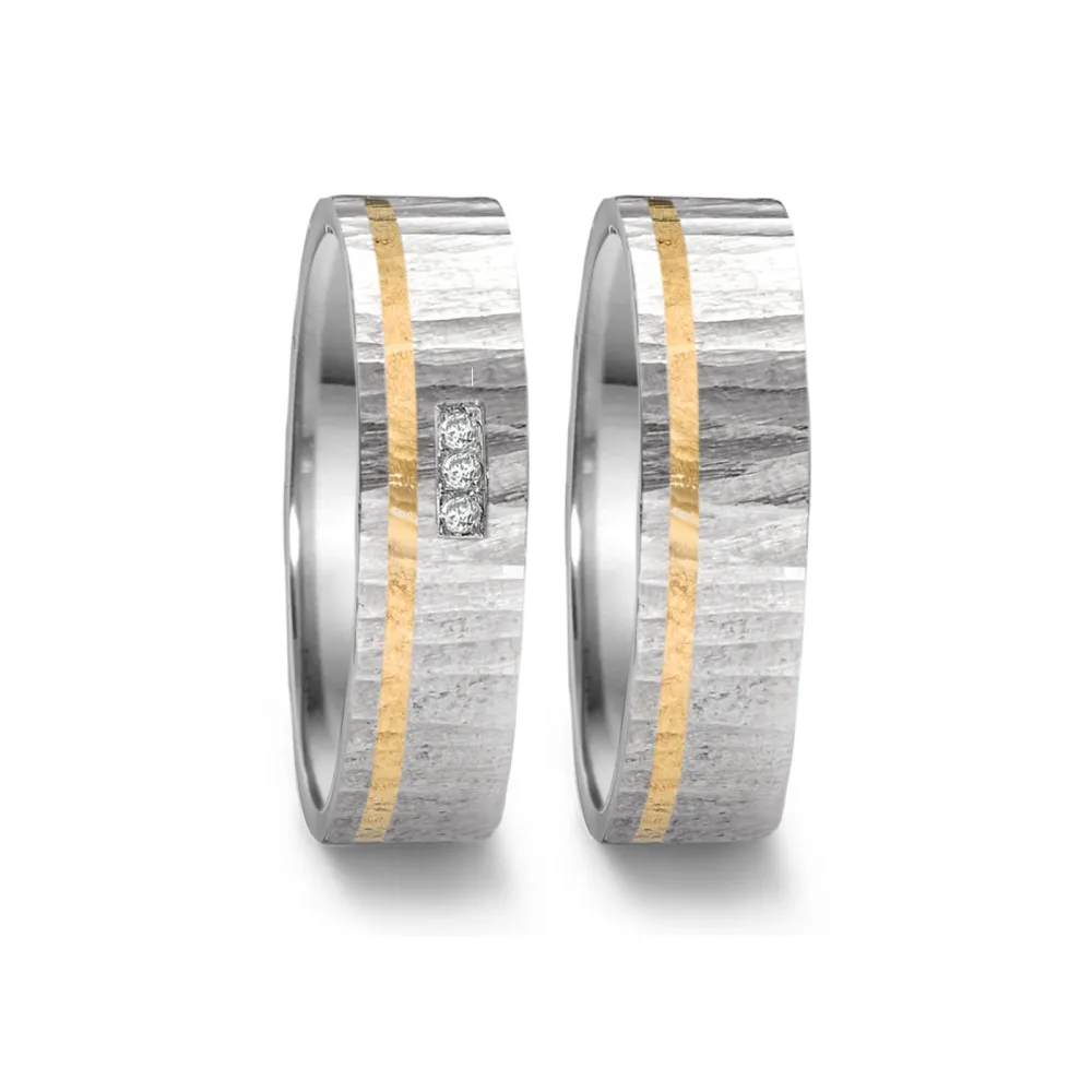Alianzas de boda de acero y oro amarillo con diamantes