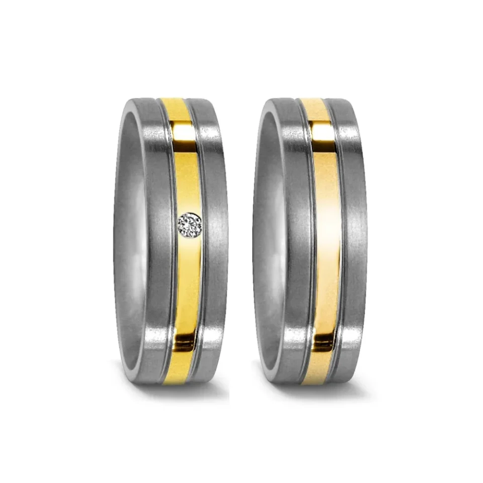Alianzas de boda de titanio y oro amarillo con diamante