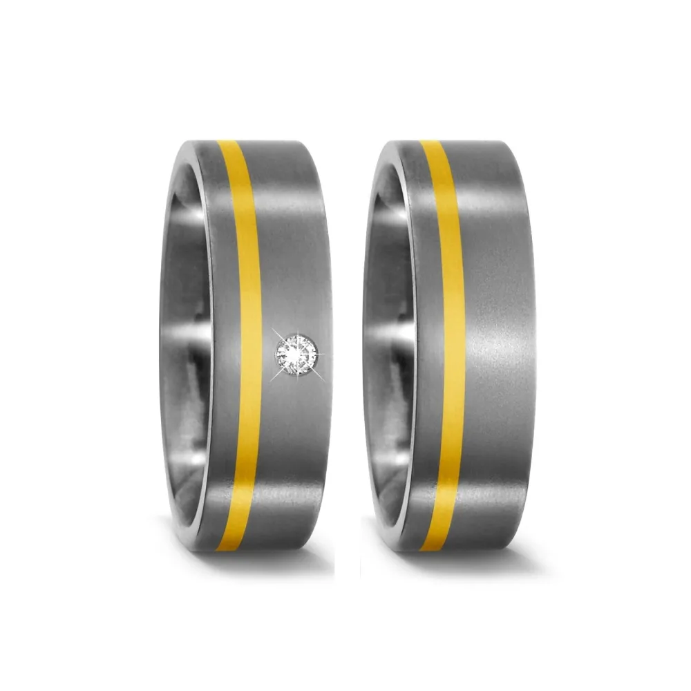 Alianzas de boda de titanio y oro amarillo con diamante