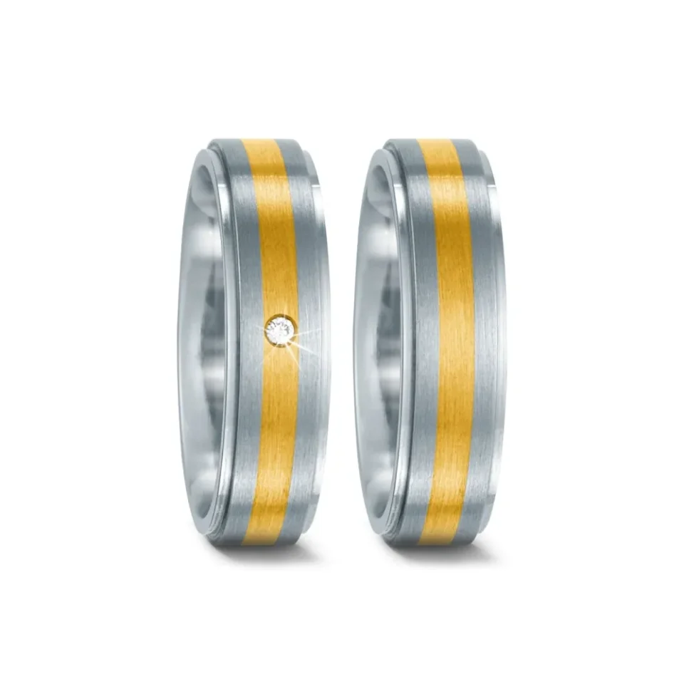 Alianzas de boda de acero y oro amarillo con diamante