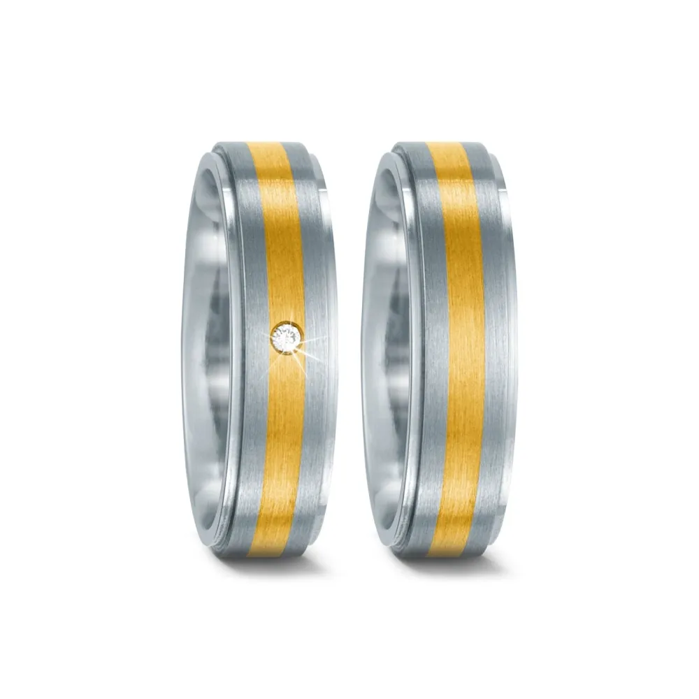 Alianzas de boda de acero y oro amarillo con diamante
