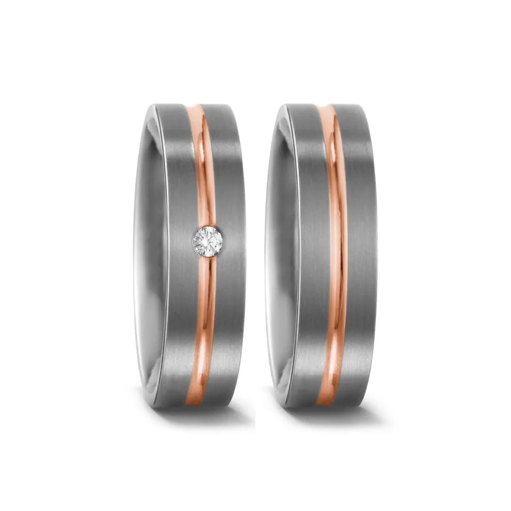 Alianzas de boda de titanio y oro rosado con diamante