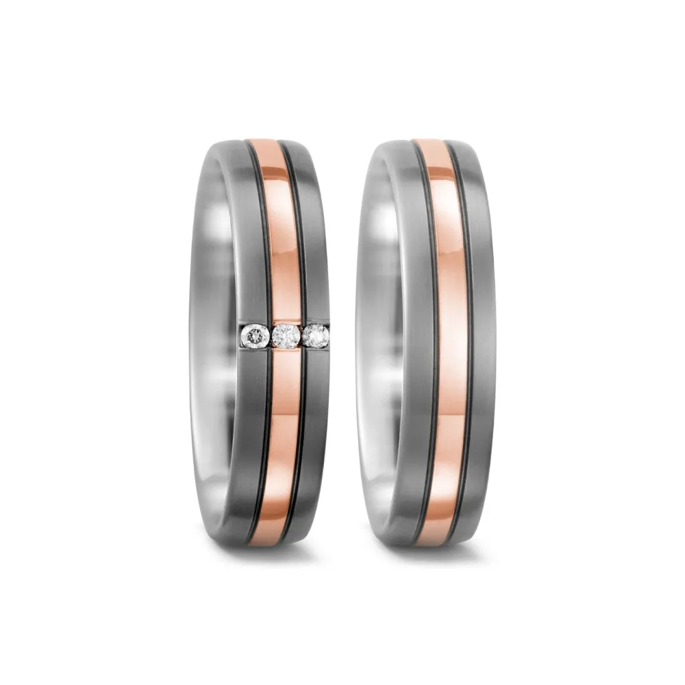 Alianzas de boda de titanio y oro rosado con diamantes