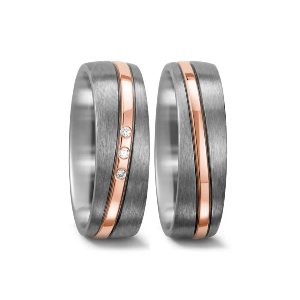 Alianzas de boda de titanio y oro rosado con diamantes