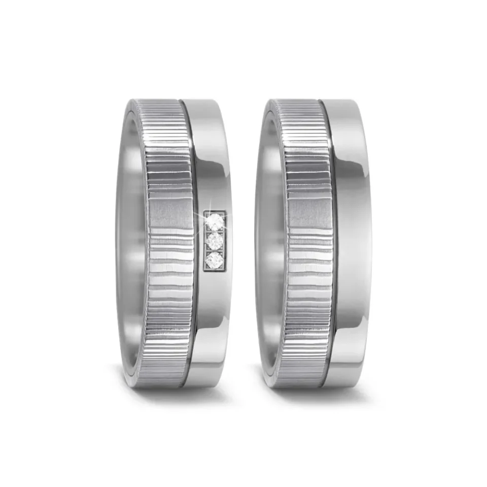 Alianzas de boda de acero damasquino con diamante