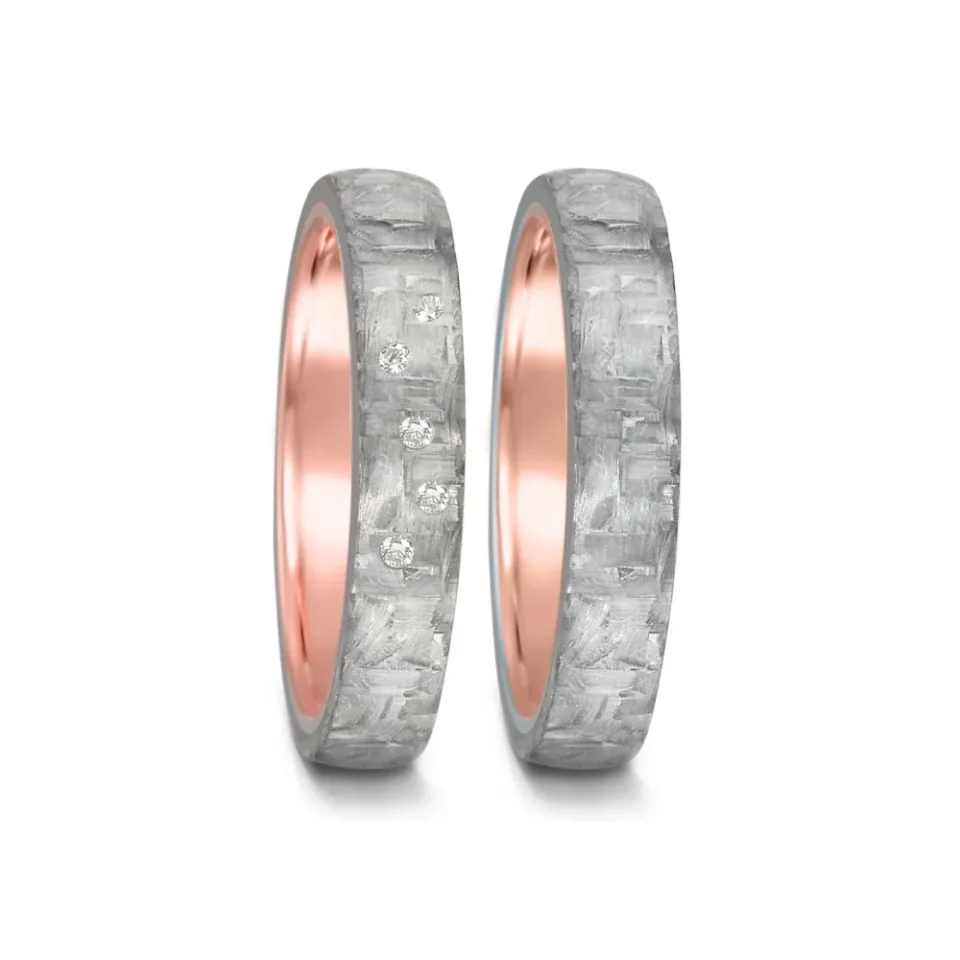 Alianzas de boda de carbono y oro rosado con diamantes