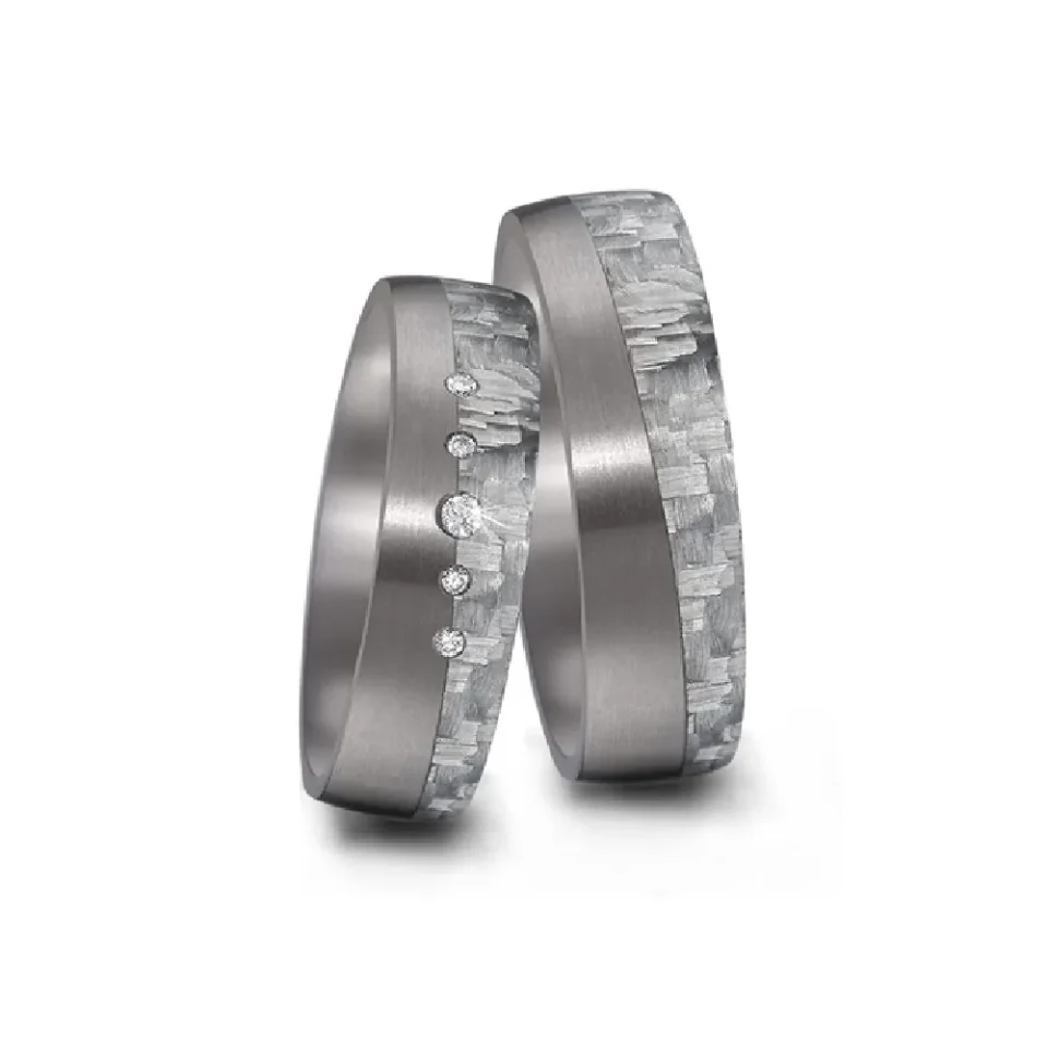 Alianzas de boda de tántalo y carbono con diamantes