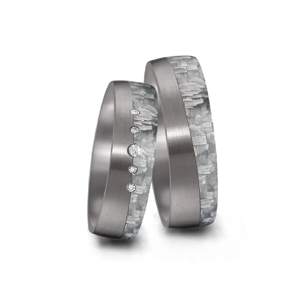 Alianzas de boda de tántalo y carbono con diamantes