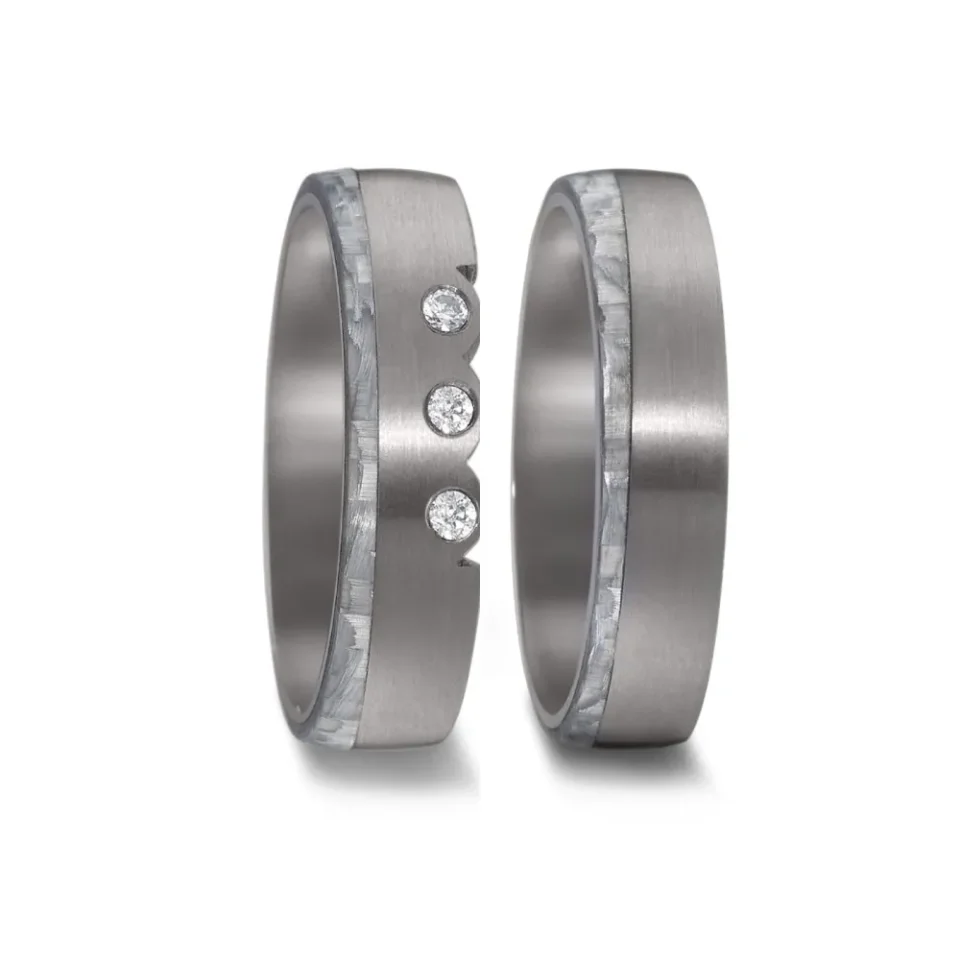 Alianzas de boda de tántalo y carbono con diamantes