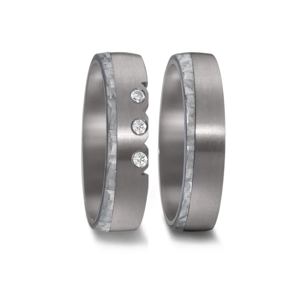 Alianzas de boda de tántalo y carbono con diamantes