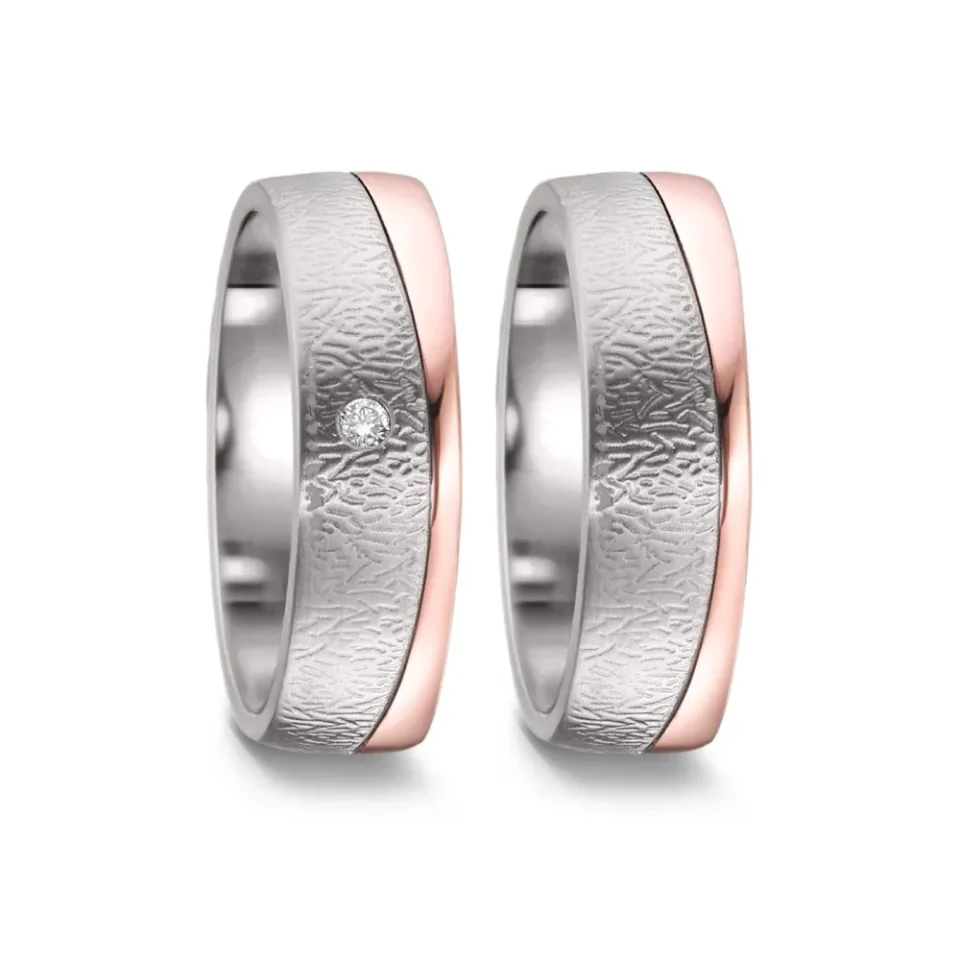 Alianzas de boda de titanio y oro rosado con diamante