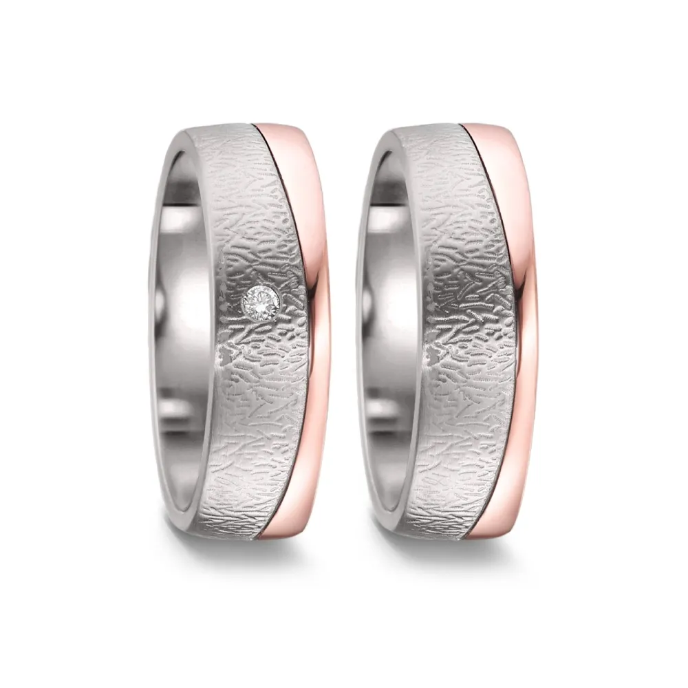 Alianzas de boda de titanio y oro rosado con diamante
