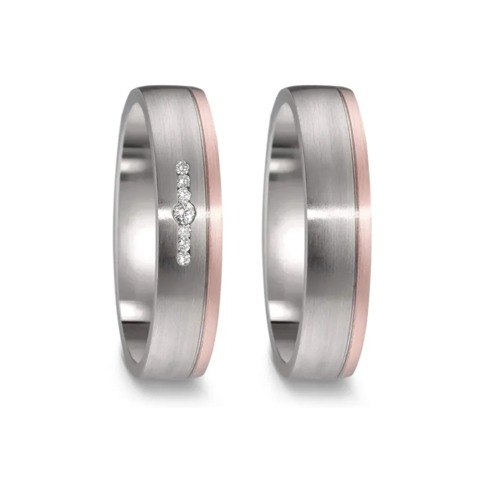 Alianzas de boda de titanio y oro rosado con diamantes