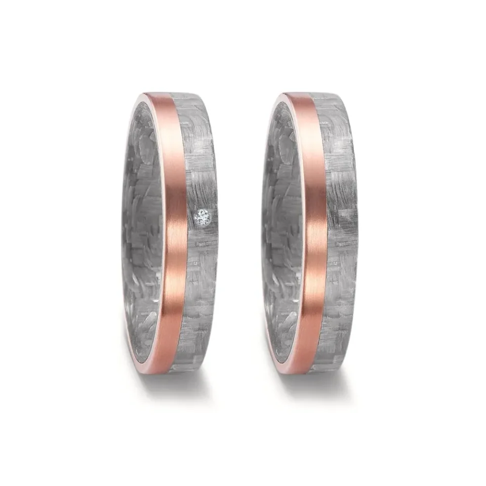 Alianzas de boda de carbono y oro rosado con diamante