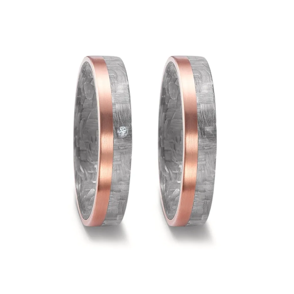 Alianzas de boda de carbono y oro rosado con diamante
