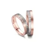 Alianzas de boda de carbono y oro rosado con diamantes