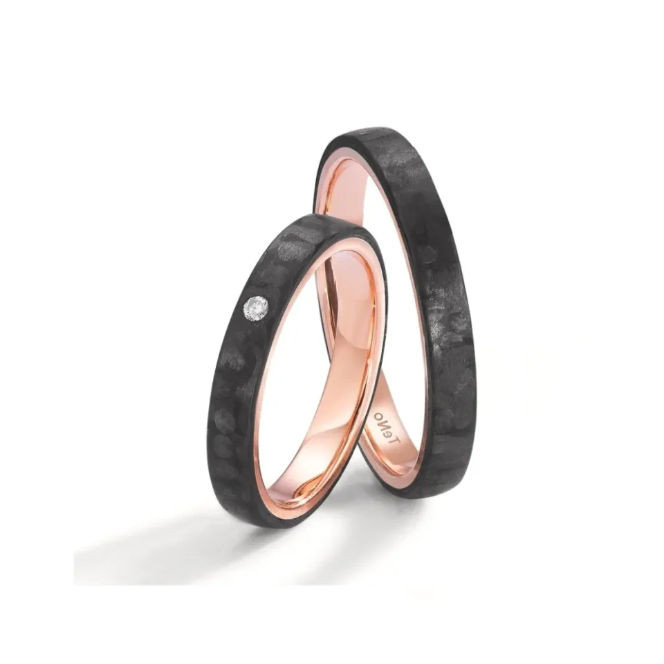 Alianzas de boda de carbono y oro rosado con diamante